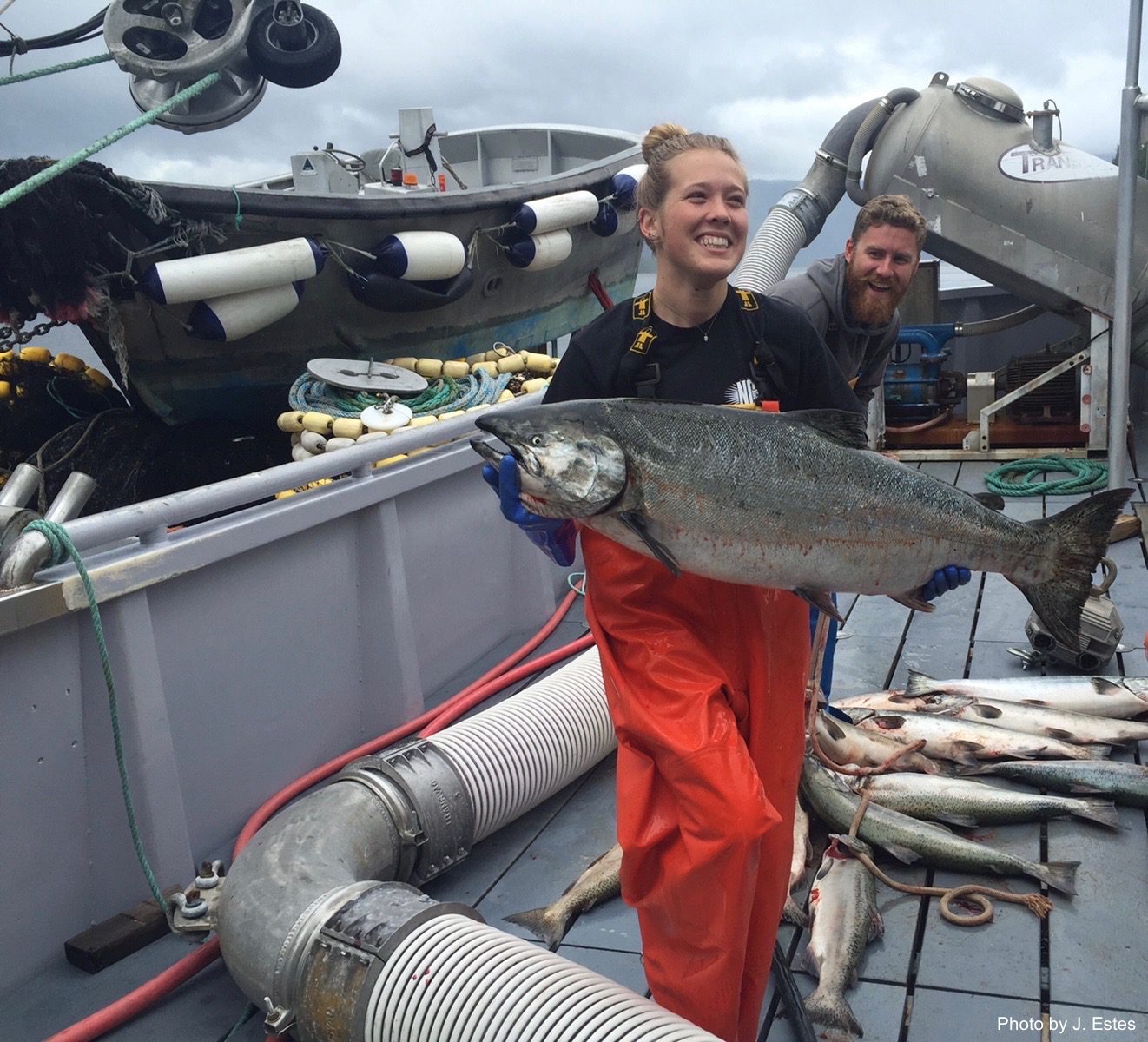 Madisyn Pyorre with Alaskan salmon