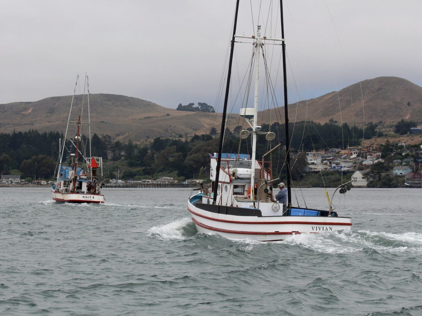 Two boats sailing on water.